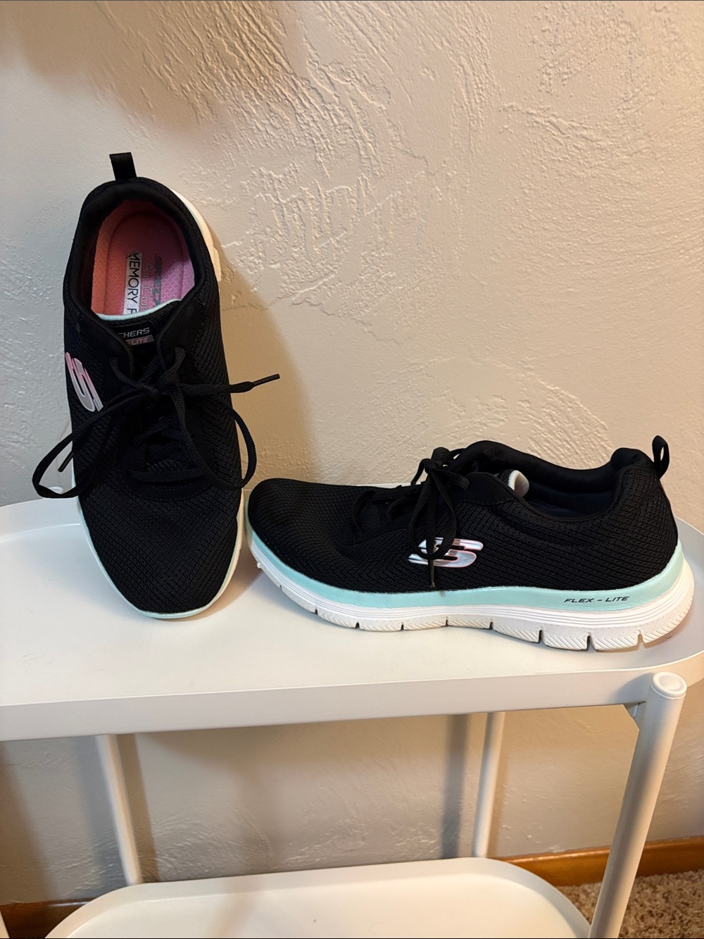 Skechers Black Athletic Slip-On Sneakers with Mint Trim and Pink Insole